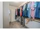 Spacious walk-in closet with built-in shelving and ample hanging space, perfect for organized storage at 45 Imperial Dr, Clayton, NC 27527