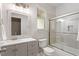 Modern bathroom with stylish vanity, shower with glass door, and contemporary fixtures at 5003 Celtic Ct, Raleigh, NC 27612