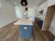 A spacious kitchen with quartz countertops, pendant lighting, and stainless steel appliances at 510 Yeowell Dr, Chapel Hill, NC 27514