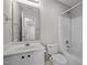 Bright bathroom with white fixtures, toilet, sink, and shower-tub combo at 608 Kinship Ln, Apex, NC 27502