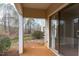 Outdoor patio with view of landscaped yard and trees, perfect for relaxation at 6131 Summerpointe Pl # 101, Raleigh, NC 27606
