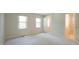 Well-lit bedroom with plush carpeting and natural light at 8201 Blue Heron Way, Raleigh, NC 27615