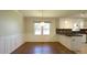 Charming dining area features wainscoting and a stylish light fixture at 8201 Blue Heron Way, Raleigh, NC 27615