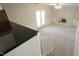 Spacious living room featuring a fireplace and double doors at 8201 Blue Heron Way, Raleigh, NC 27615