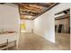 Spacious unfinished basement with concrete floors, exposed ceiling and utility sink at 8415 Meadow View Ln, Bahama, NC 27503