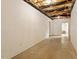 Spacious unfinished basement with concrete floors and exposed ceiling at 8415 Meadow View Ln, Bahama, NC 27503