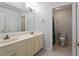 Bathroom featuring double sinks, tile floors, and separate toilet area at 8415 Meadow View Ln, Bahama, NC 27503