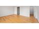 Spacious bedroom featuring hardwood floors, neutral walls, and plenty of natural light at 8415 Meadow View Ln, Bahama, NC 27503