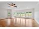Bright and open living area with natural light, recessed lighting, and hardwood floors at 8415 Meadow View Ln, Bahama, NC 27503