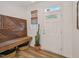 Cozy entryway with unique wood bench and cacti, offering a warm welcome into the home at 903 Grace Point Rd, Morrisville, NC 27560