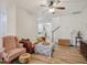 Spacious living room with hardwood floors and comfortable seating, perfect for relaxing or entertaining at 903 Grace Point Rd, Morrisville, NC 27560
