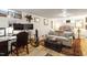 Finished basement with a cozy workspace, comfortable seating, and stylish decor, offering a versatile and inviting living area at 1100 Brooks Ave, Raleigh, NC 27607