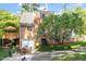 Back exterior of home with a deck, patio, garage access and access to the backyard at 1100 Brooks Ave, Raleigh, NC 27607