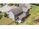 Aerial view of the house showcasing backyard kitchen, patio, and screened in porch at 112 Pearsall Farm Ln, Clayton, NC 27527
