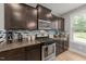 Well-equipped kitchen with stainless steel appliances, tile backsplash, and ample cabinet space at 112 Pearsall Farm Ln, Clayton, NC 27527