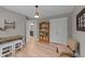 Home office with a bookshelf, chair, and a view into the bathroom at 112 Pearsall Farm Ln, Clayton, NC 27527