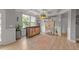 Stylish sitting room with a bar area, wood flooring, and neutral decor at 112 Pearsall Farm Ln, Clayton, NC 27527
