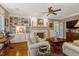 Inviting living room with built-in bookshelves, fireplace, and comfortable seating arrangement at 116 Berry Hill Dr, Raleigh, NC 27615