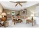 Cozy living room with plush seating, ambient lighting, and carpeted floors at 116 Berry Hill Dr, Raleigh, NC 27615
