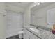 Bathroom featuring a shower over the tub and a vanity with a granite countertop at 119 Blossom Creek Dr, Garner, NC 27529