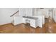 Hallway desk area with drawers, and a view of the stairs and adjacent rooms at 1217 Chalk Maple Dr, Cary, NC 27519
