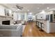 Bright living room with hardwood floors, fireplace, and an open layout at 1217 Chalk Maple Dr, Cary, NC 27519