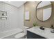 Contemporary bathroom with subway tile shower, modern vanity and updated fixtures at 1621 N Park Ave, Burlington, NC 27217