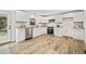 Bright kitchen with granite countertops, stainless steel appliances, and subway tile backsplash at 1621 N Park Ave, Burlington, NC 27217