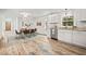 Bright, combined kitchen/dining area with stainless steel appliances and updated cabinets at 1621 N Park Ave, Burlington, NC 27217