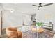 Spacious living room with a ceiling fan, recessed lighting, and hardwood-style flooring at 1621 N Park Ave, Burlington, NC 27217