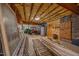 Unfinished basement features storage options, utility access, and space for projects at 1672 Wheeler Dr, Angier, NC 27501