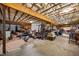 Unfinished basement space with exposed ceiling insulation and concrete floors at 1672 Wheeler Dr, Angier, NC 27501