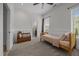 Comfortable bedroom with neutral tones featuring a wooden bed frame and a charming teddy bear on a toy chest at 1672 Wheeler Dr, Angier, NC 27501