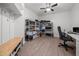 Versatile bonus room with laminate flooring and storage solutions at 1672 Wheeler Dr, Angier, NC 27501