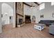 Inviting living room fireplace with stone accents and a wooden mantel providing warmth and style at 1672 Wheeler Dr, Angier, NC 27501