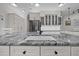 Close-up on granite counters featuring double sinks, showcasing the spacious island design at 1672 Wheeler Dr, Angier, NC 27501