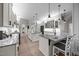 Modern kitchen with double islands, stylish countertops, and white cabinetry offering ample storage at 1672 Wheeler Dr, Angier, NC 27501
