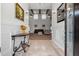 Inviting foyer leading to a spacious living room with high ceilings and exposed beams at 1672 Wheeler Dr, Angier, NC 27501