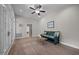 Relaxing living room with a ceiling fan, bench seating, and nice flooring at 1672 Wheeler Dr, Angier, NC 27501