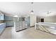 Expansive kitchen featuring custom cabinetry, a large cooktop island, and natural light, great for entertaining at 1705 Nottingham Rd, Raleigh, NC 27607