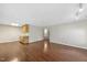 Inviting living room with warm hardwood floors and neutral walls at 1705 Nottingham Rd, Raleigh, NC 27607