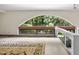 A spacious living area featuring beautiful natural light and views at 1705 Nottingham Rd, Raleigh, NC 27607