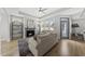 Bright living room with modern fireplace, stylish decor, and large windows for plenty of natural light at 1727 Pinecliff Ct, Fuquay Varina, NC 27526