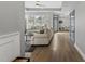 Inviting living room featuring hardwood floors, comfortable seating, and large windows offering great views at 1727 Pinecliff Ct, Fuquay Varina, NC 27526