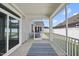 Comfortable screened porch with outdoor lounge furniture, ideal for relaxation and enjoying the backyard at 1727 Pinecliff Ct, Fuquay Varina, NC 27526