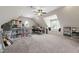 Expansive bonus room with built-in shelves, bench seating, and storage is adaptable for various lifestyle needs at 1831 Middlebrook Dr, Raleigh, NC 27615