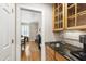 Butler's pantry with sink and cabinets, provides additional prep and storage space at 1831 Middlebrook Dr, Raleigh, NC 27615