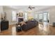 Cozy living room with hardwood floors, fireplace, french doors, and ample natural light at 1831 Middlebrook Dr, Raleigh, NC 27615