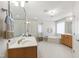 Luxurious main bathroom featuring double vanities, a glass shower, and a relaxing soaking tub at 1831 Middlebrook Dr, Raleigh, NC 27615