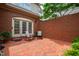 Charming brick patio with seating area, perfect for outdoor dining and relaxation at 1831 Middlebrook Dr, Raleigh, NC 27615